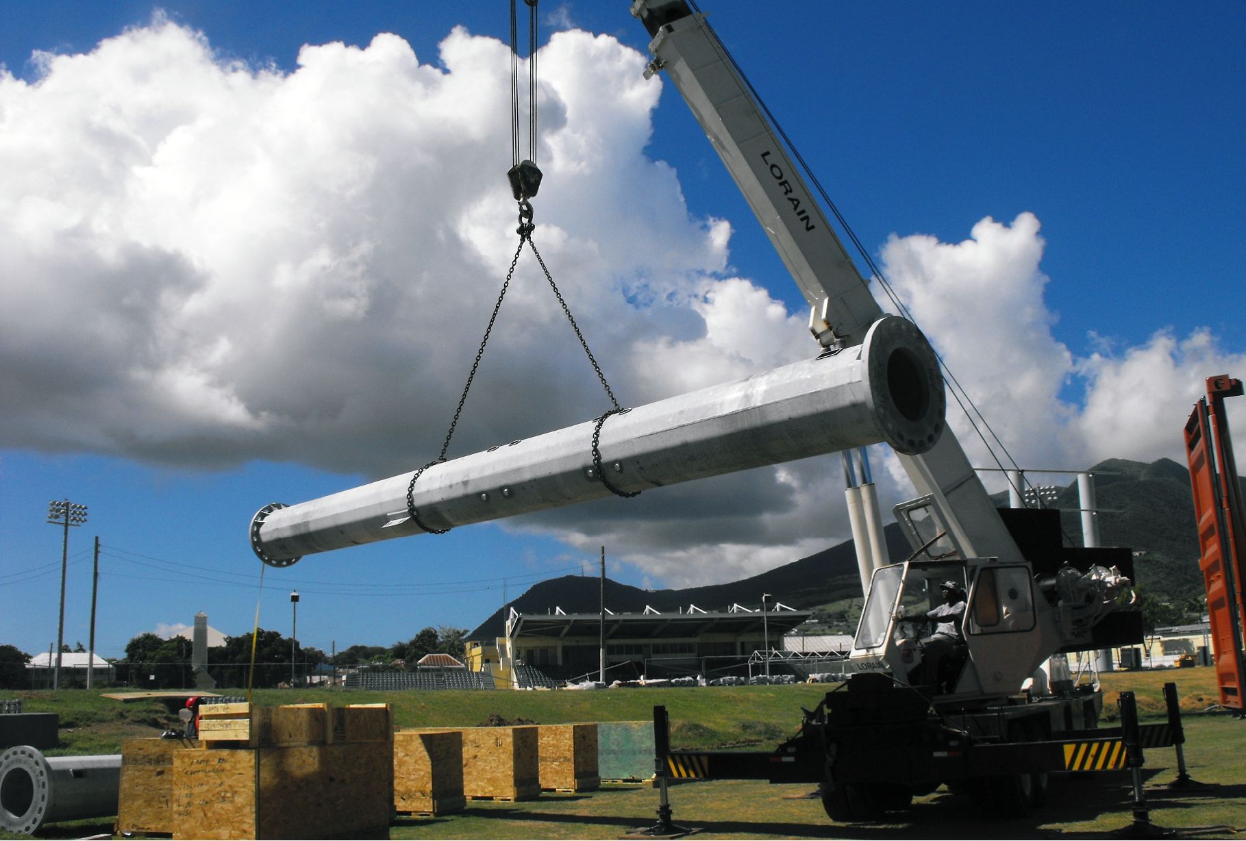Pole-replacement service by South Florida Pole Setters near me, with cranes and trucks at work in Stuart, FL.