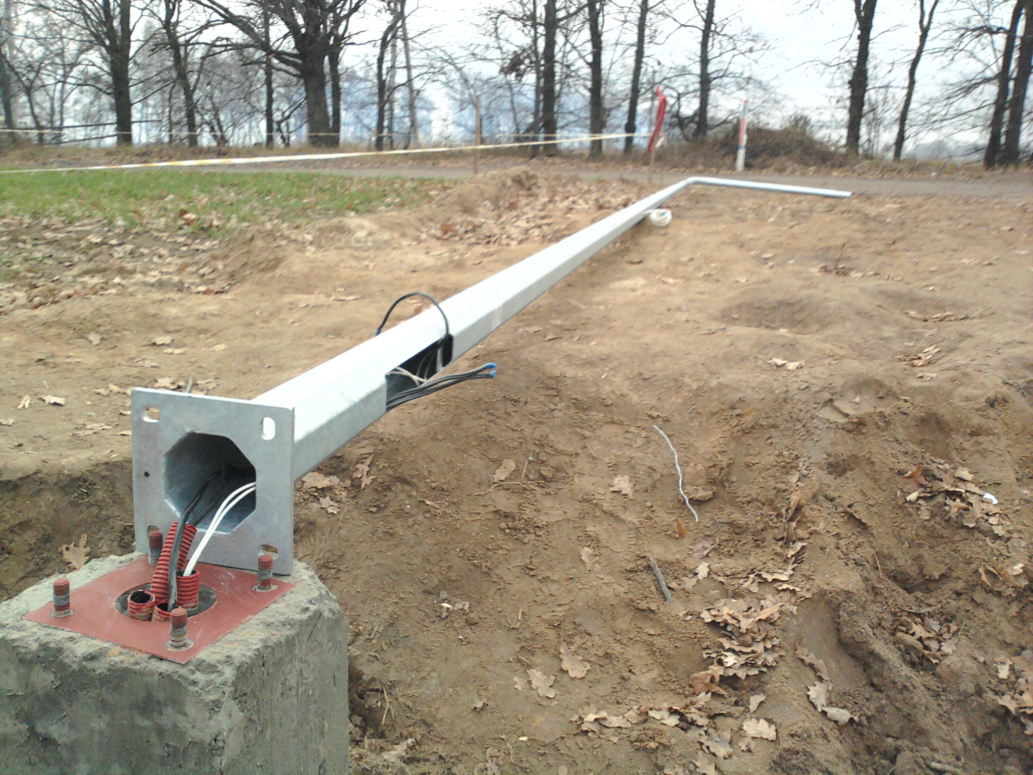 Light pole installation process by South Florida Pole Setters and Crane Service in Stuart, FL