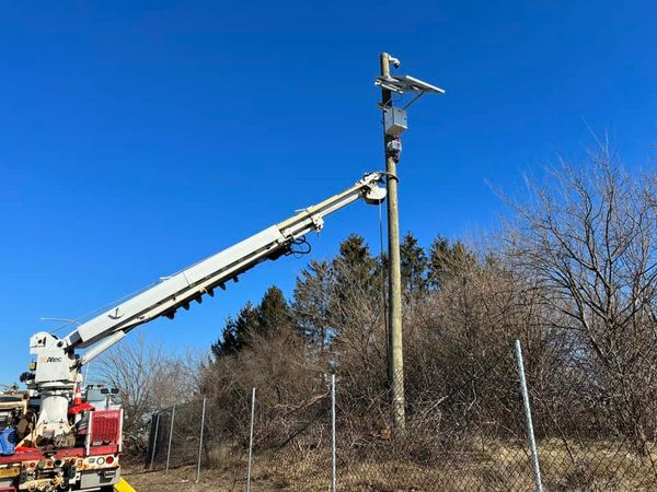 South Florida Pole Setters installing durable utility poles for infrastructure.