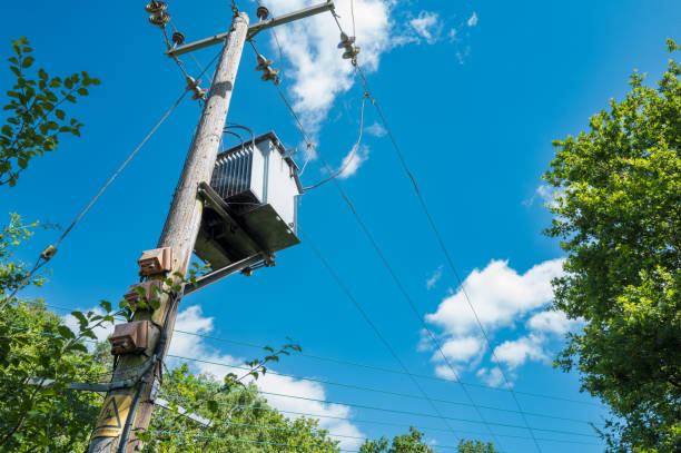 Transportation truck delivering poles for installation in Florida.