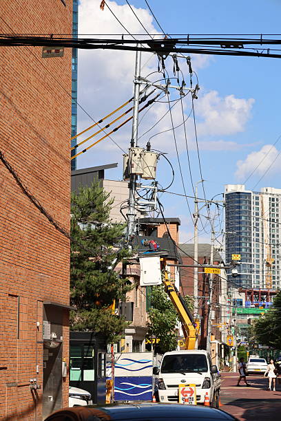 Reliable contractor setting poles for neighborhood lighting upgrades.