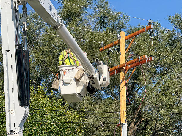 Florida pole setter managing pole angles during foundation drilling.