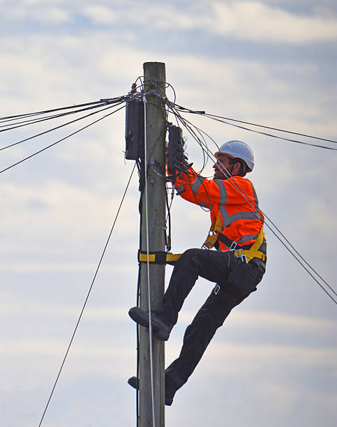 Heavy machinery used for accurate power pole installation process