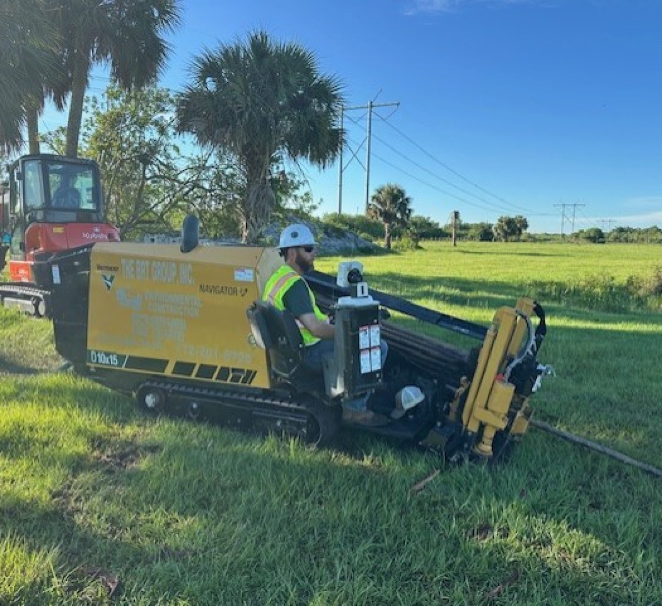 Crane service by South Florida Pole Setters setting power poles in Stuart, FL near me